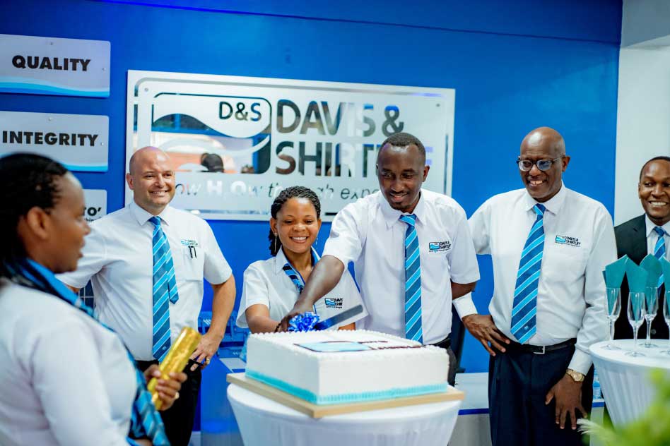D&S opens 5 new branches, pictured is MD Edward Davis, Anthony Wangondu and staff